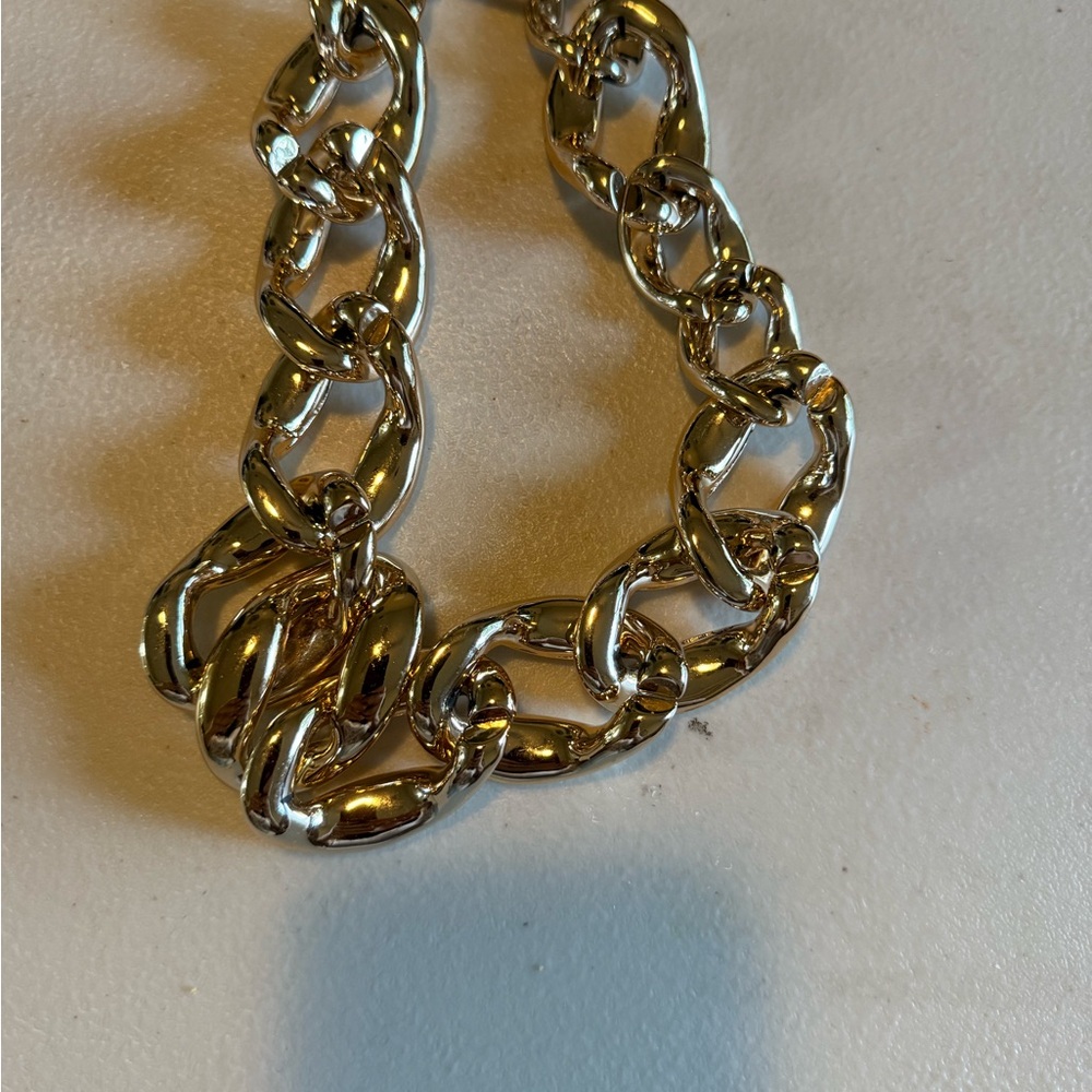 Plastic gold chain necklace.